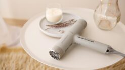 white and black hair brush on white round plate