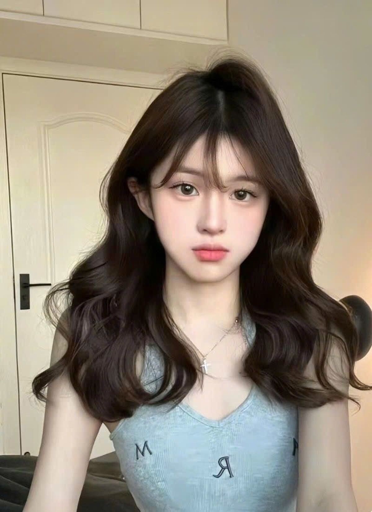 Tóc uốn gợn mái thưa